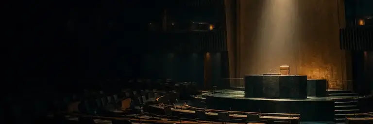 Illustration of an empty international assembly hall with a lit rostrum